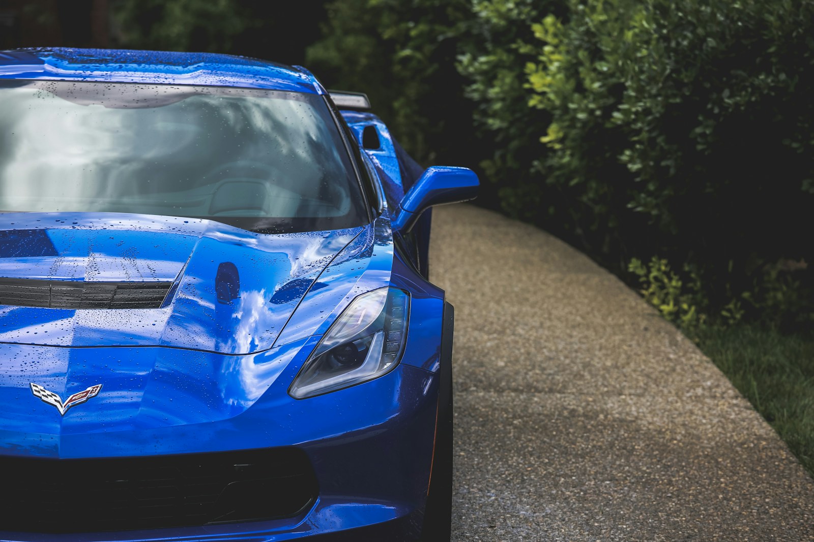 Blue Corvette front-end detail and headlight close-up